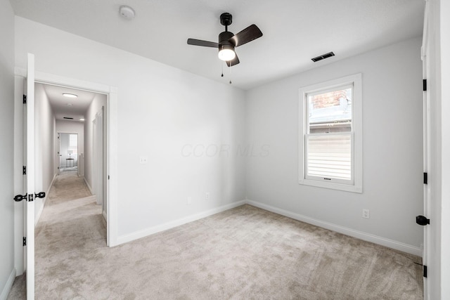 1116 Summit St Unit 1114, Columbus, OH 43201 - carpeted empty room with a smoke detector, ceiling fan, and baseboards