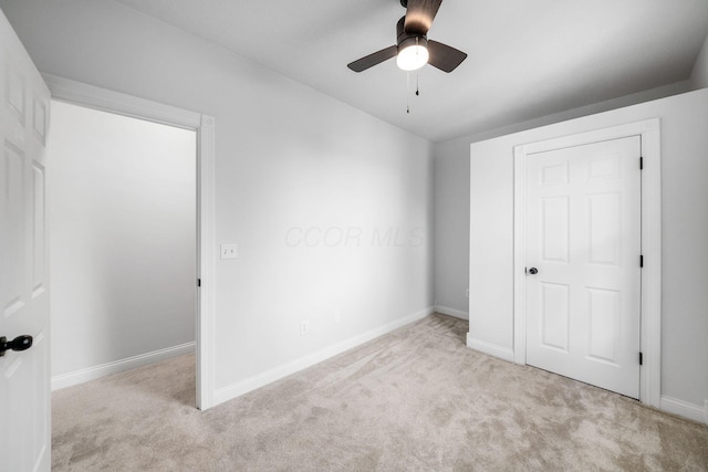1116 Summit St Unit 1114, Columbus, OH 43201 - unfurnished bedroom featuring carpet floors, baseboards, and ceiling fan