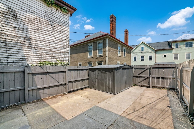 1116 Summit St Unit 1114, Columbus, OH 43201 - fenced backyard featuring a gate and a patio area