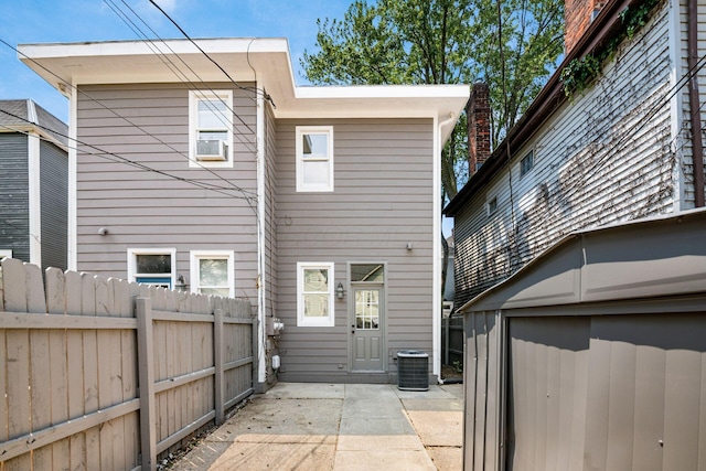 1116 Summit St Unit 1114, Columbus, OH 43201 - rear view of property featuring central AC unit, a patio area, and cooling unit