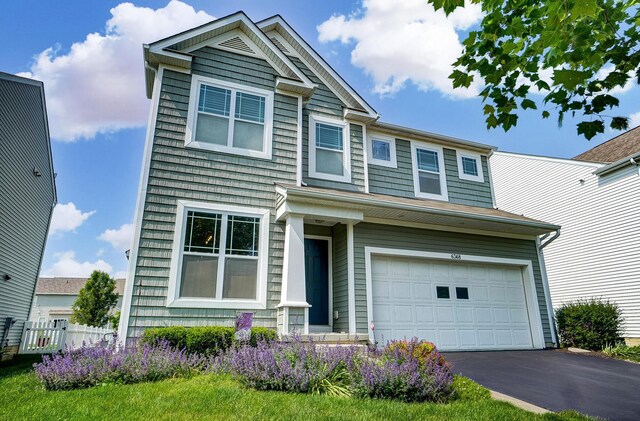 6368 Casado Dr, Columbus, OH 43213 - view of front facade featuring driveway and a garage
