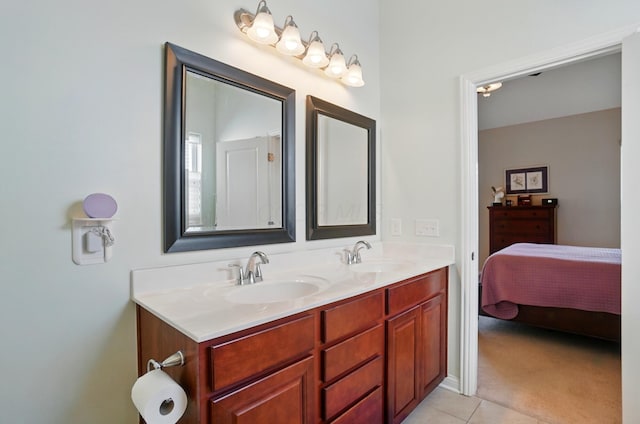 6368 Casado Dr, Columbus, OH 43213 - ensuite bathroom featuring double vanity and tile patterned floors