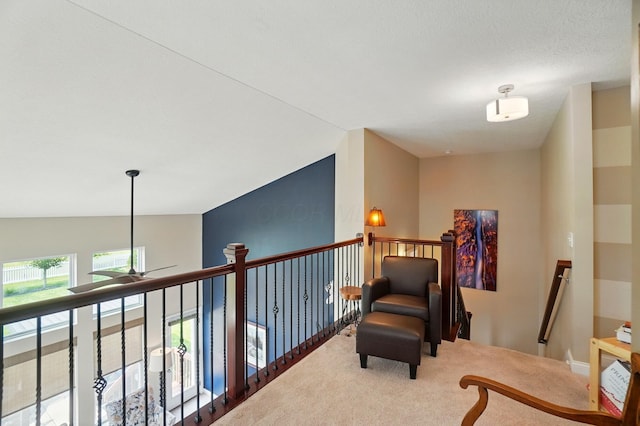 6368 Casado Dr, Columbus, OH 43213 - sitting room with a ceiling fan, carpet flooring, and an upstairs landing