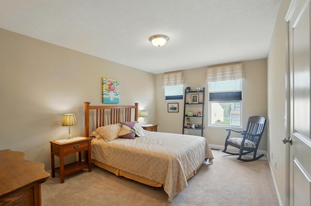6368 Casado Dr, Columbus, OH 43213 - bedroom with light carpet and baseboards