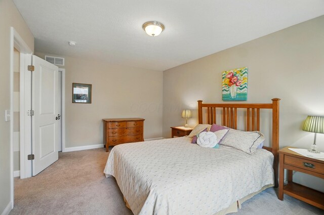 6368 Casado Dr, Columbus, OH 43213 - bedroom with light carpet and baseboards