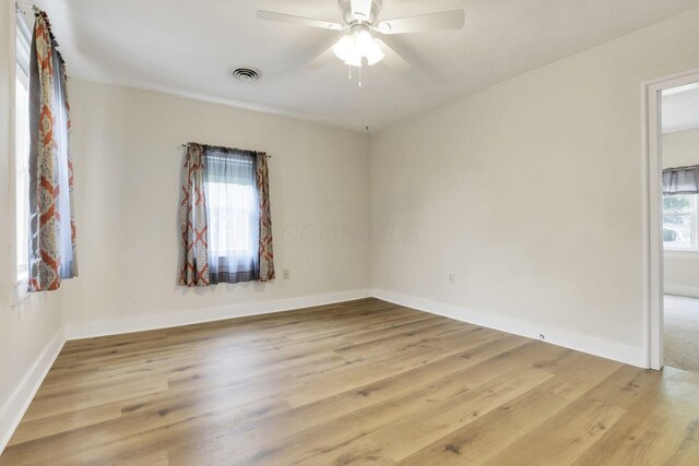 115 N Walnut St, Baltimore, OH 43105 - empty room featuring healthy amount of natural light, light wood-style flooring, ceiling fan, and baseboards