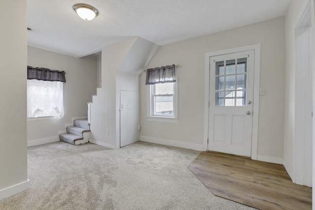 115 N Walnut St, Baltimore, OH 43105 - carpeted entryway featuring baseboards and stairway