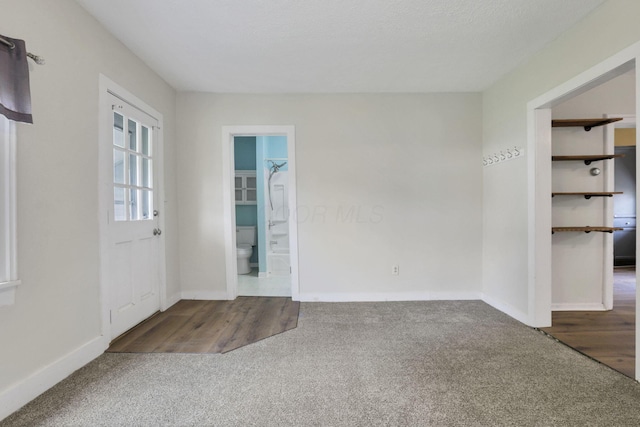 115 N Walnut St, Baltimore, OH 43105 - carpeted empty room featuring baseboards