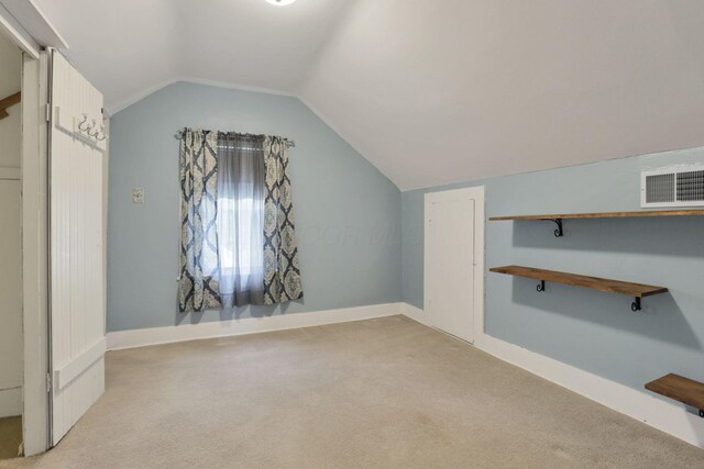 115 N Walnut St, Baltimore, OH 43105 - additional living space featuring light carpet, lofted ceiling, and baseboards