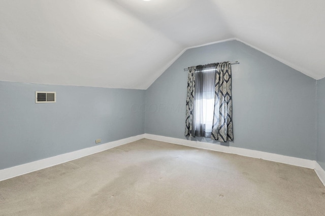 115 N Walnut St, Baltimore, OH 43105 - additional living space featuring vaulted ceiling, carpet floors, and baseboards