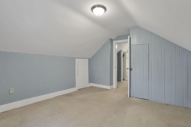 115 N Walnut St, Baltimore, OH 43105 - additional living space featuring light carpet, vaulted ceiling, and baseboards