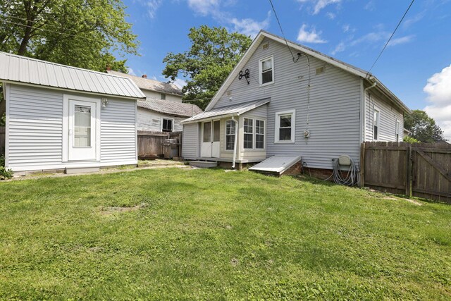 115 N Walnut St, Baltimore, OH 43105 - back of property with metal roof and an outdoor structure