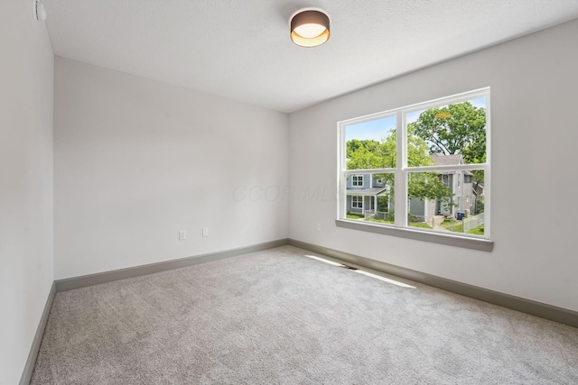 63 Hayden Ave, Columbus, OH 43222 - spare room featuring carpet floors and baseboards