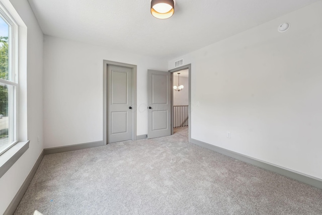 63 Hayden Ave, Columbus, OH 43222 - unfurnished bedroom featuring carpet floors and baseboards