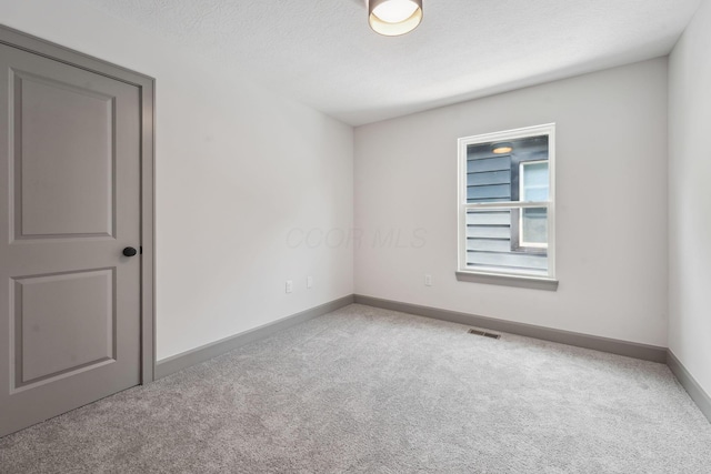 63 Hayden Ave, Columbus, OH 43222 - empty room featuring carpet and baseboards