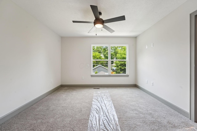 63 Hayden Ave, Columbus, OH 43222 - carpeted empty room featuring ceiling fan and a textured ceiling
