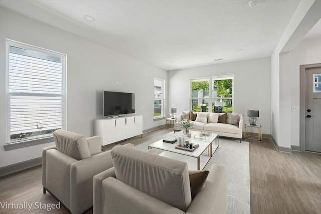 63 Hayden Ave, Columbus, OH 43222 - living room featuring wood finished floors and baseboards