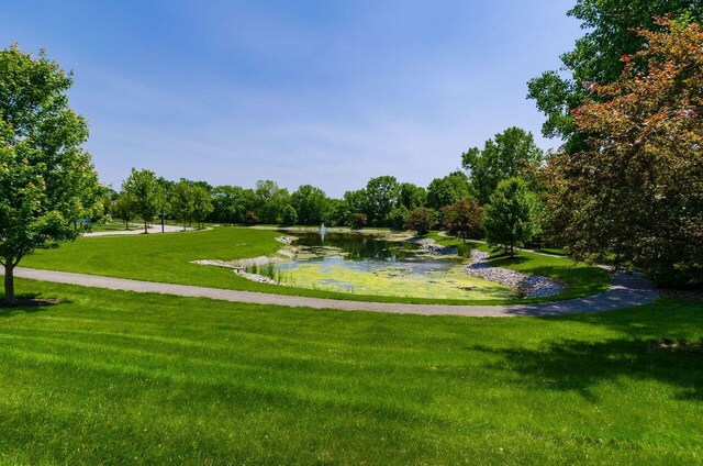 1201 Stone Trail Dr, Blacklick, OH 43004 - view of home's community with a lawn and a water view
