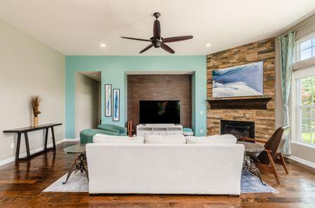 1201 Stone Trail Dr, Blacklick, OH 43004 - living area featuring a stone fireplace, baseboards, a ceiling fan, wood finished floors, and recessed lighting