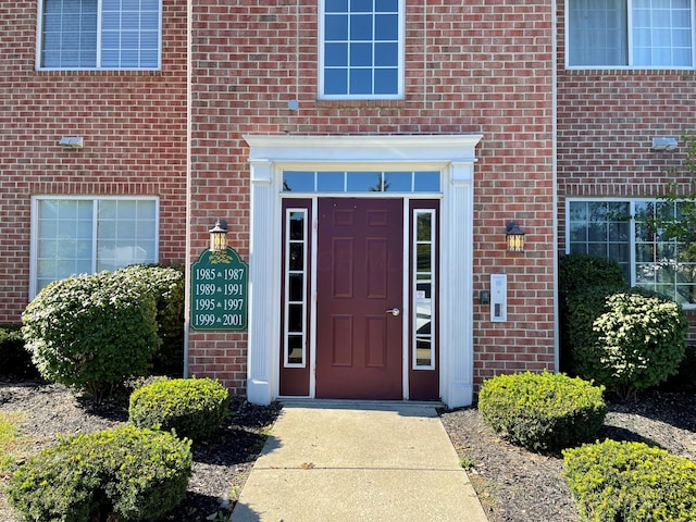 2001 Berrancher Dr, Columbus, OH 43228 - doorway to property featuring brick siding