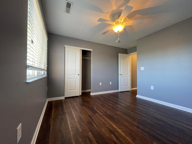 2001 Berrancher Dr, Columbus, OH 43228 - unfurnished bedroom with wood finished floors, baseboards, a closet, and ceiling fan