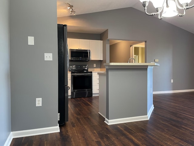 2001 Berrancher Dr, Columbus, OH 43228 - kitchen featuring black appliances, lofted ceiling, light countertops, a chandelier, and white cabinets