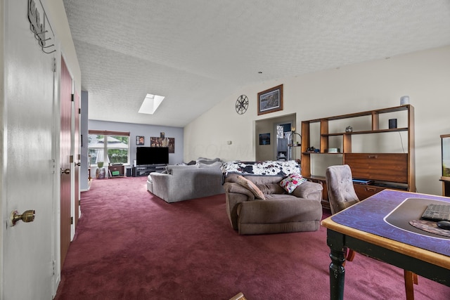 993 Esther Dr, Columbus, OH 43207 - living area with a skylight, carpet floors, vaulted ceiling, and a textured ceiling