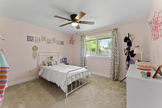 6576 Creon Dr, Reynoldsburg, OH 43068 - bedroom featuring light carpet, baseboards, and a ceiling fan