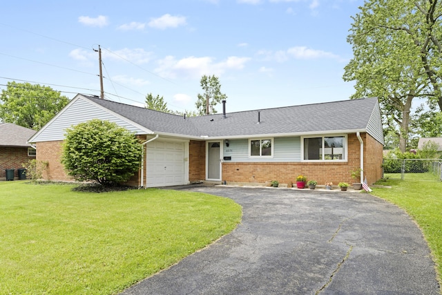 6576 Creon Dr, Reynoldsburg, OH 43068 - ranch-style house with brick siding, a garage, driveway, and a shingled roof