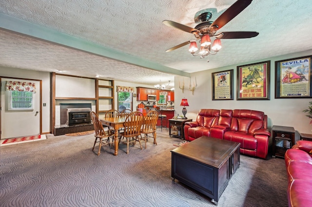 6769 Thoreau Ln NE, Baltimore, OH 43105 - living room with a textured ceiling, carpet, a ceiling fan, and a chandelier