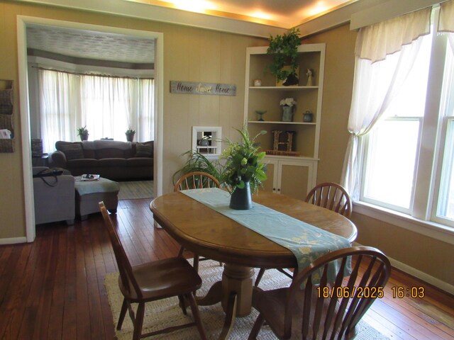 603 N Court St, Circleville, OH 43113 - dining area with hardwood / wood-style floors and baseboards
