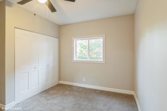 823 S Walnut St, Bucyrus, OH 44820 - unfurnished bedroom with carpet flooring, a closet, baseboards, and ceiling fan