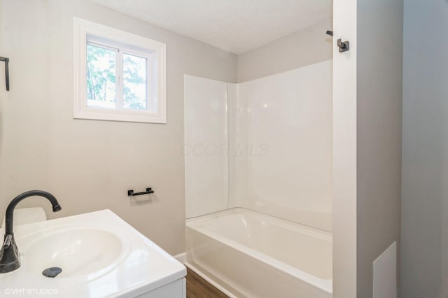 823 S Walnut St, Bucyrus, OH 44820 - bathroom with washtub / shower combination and vanity