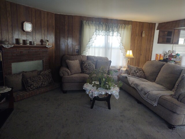 71 Knollwood Ct, South Bloomfield, OH 43103 - living area featuring wooden walls, carpet floors, and a brick fireplace