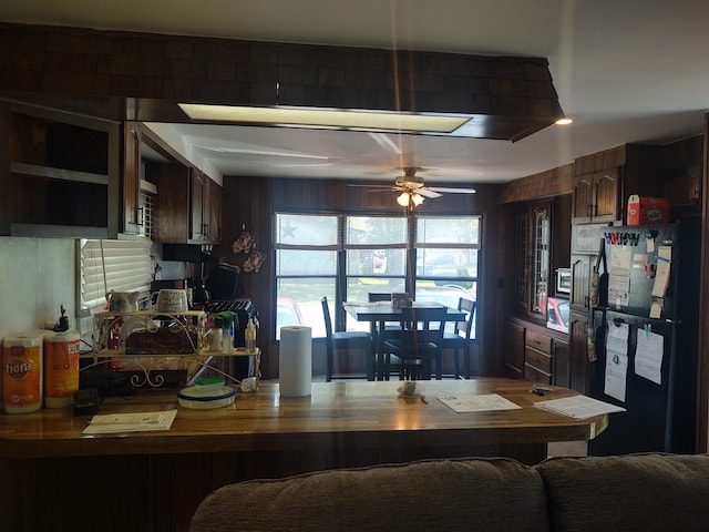71 Knollwood Ct, South Bloomfield, OH 43103 - kitchen featuring freestanding refrigerator, ceiling fan, dark brown cabinetry, and open shelves