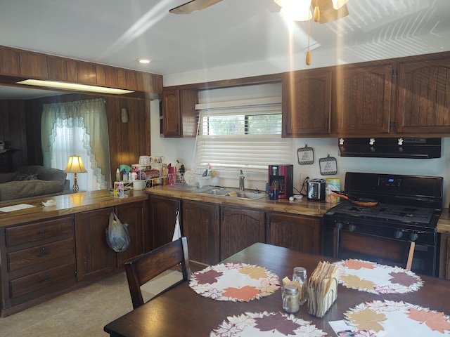 71 Knollwood Ct, South Bloomfield, OH 43103 - kitchen featuring range hood, black gas range oven, and a ceiling fan