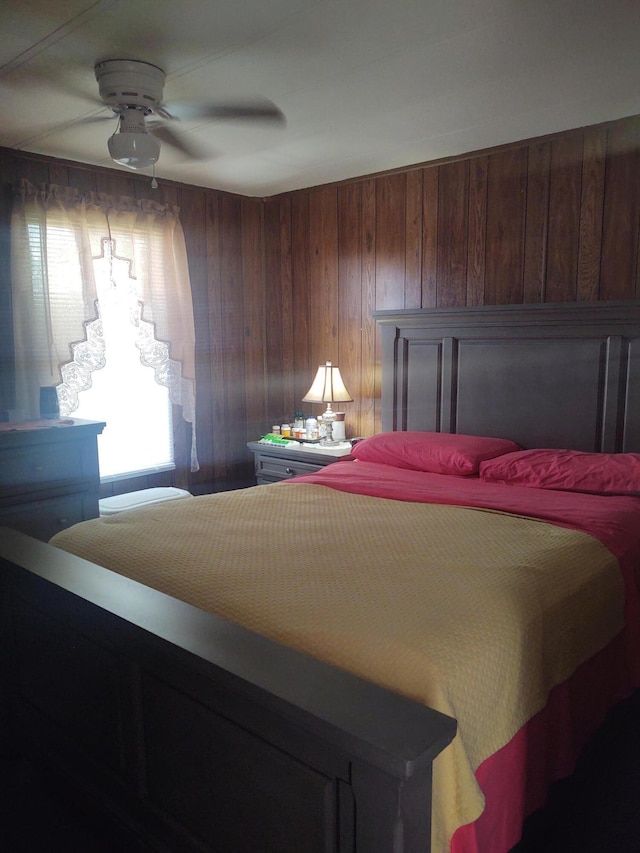 71 Knollwood Ct, South Bloomfield, OH 43103 - bedroom featuring wood walls and ceiling fan