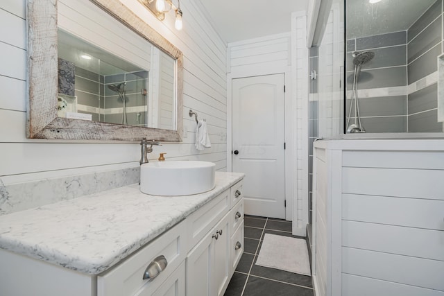 610 Chestnut St, Dresden, OH 43821 - bathroom featuring vanity, tiled shower, and tile patterned floors