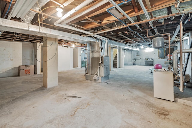 610 Chestnut St, Dresden, OH 43821 - unfinished below grade area with stairway and heating unit