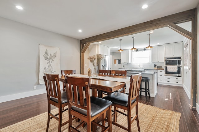 610 Chestnut St, Dresden, OH 43821 - dining area featuring recessed lighting, dark wood-style flooring, and beamed ceiling