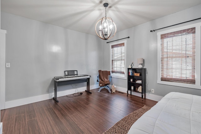 610 Chestnut St, Dresden, OH 43821 - bedroom featuring a chandelier and wood finished floors