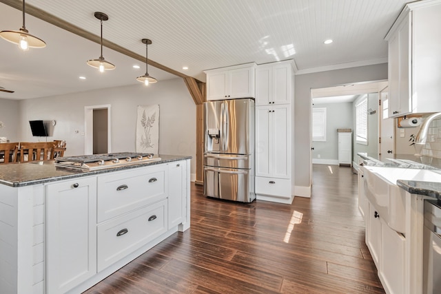 610 Chestnut St, Dresden, OH 43821 - kitchen featuring appliances with stainless steel finishes, recessed lighting, dark stone countertops, white cabinets, and pendant lighting
