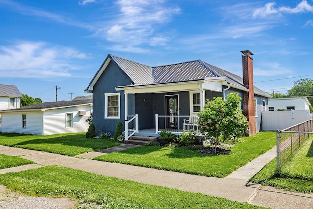 610 Chestnut St, Dresden, OH 43821 - view of front of property with stucco siding, covered porch, a metal roof, and a chimney