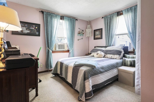 6769 Hildreth Ave, Columbus, OH 43229 - bedroom with light carpet, a textured ceiling, and cooling unit