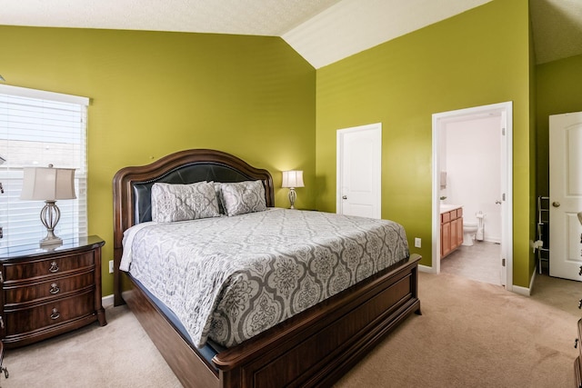 1420 Bellow Falls Pl, Columbus, OH 43228 - bedroom featuring light carpet, baseboards, connected bathroom, and high vaulted ceiling