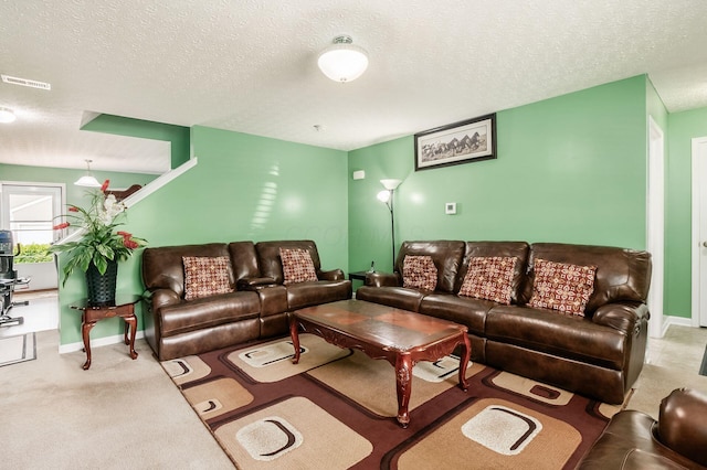 1420 Bellow Falls Pl, Columbus, OH 43228 - living area featuring a textured ceiling, carpet floors, and baseboards