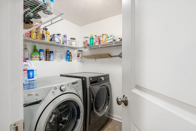 1420 Bellow Falls Pl, Columbus, OH 43228 - laundry area featuring independent washer and dryer, tile patterned floors, and a textured ceiling