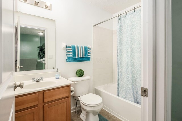 1420 Bellow Falls Pl, Columbus, OH 43228 - bathroom featuring vanity, toilet, shower / tub combo, and tile patterned floors