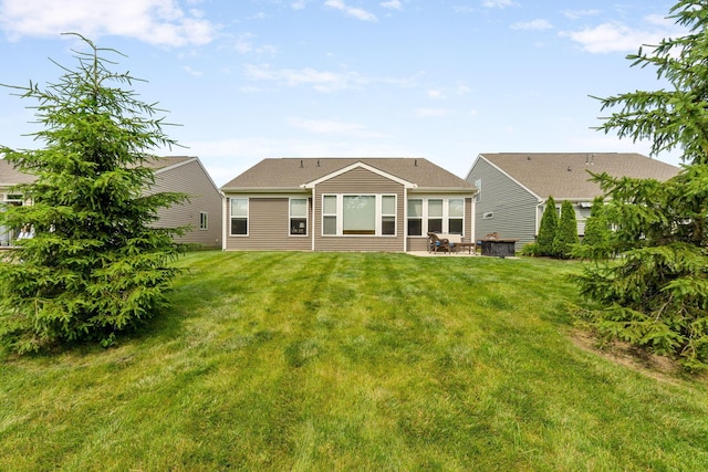 3736 Sanctuary, Hilliard, OH 43026 - rear view of property featuring a yard and a patio area