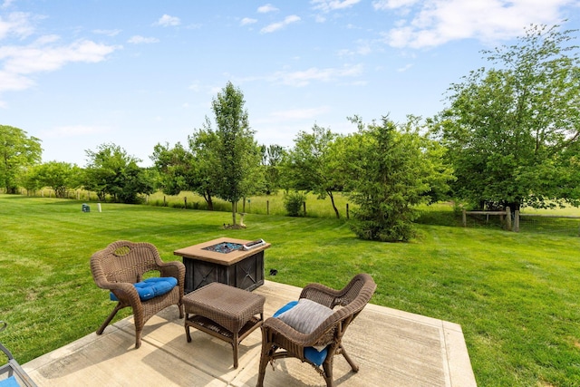 3736 Sanctuary, Hilliard, OH 43026 - view of patio / terrace with view of wooded area and a fire pit